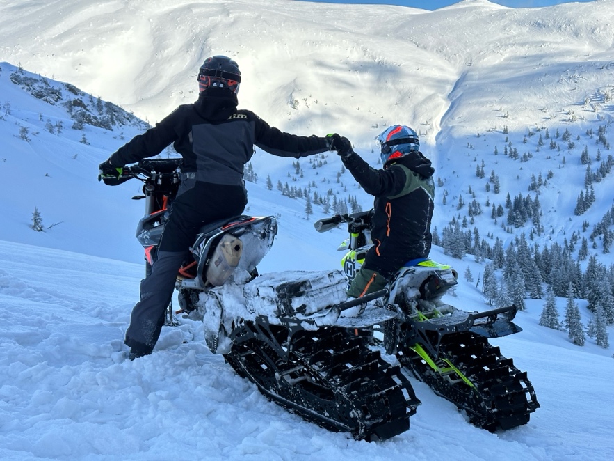 Snowbike use two in mountains